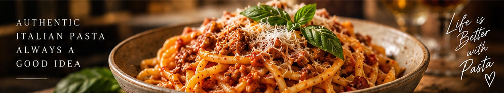 Bowl of pasta with ragù, parmesan and basil
