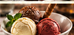 Two scoops of vanilla and chocolate ice cream