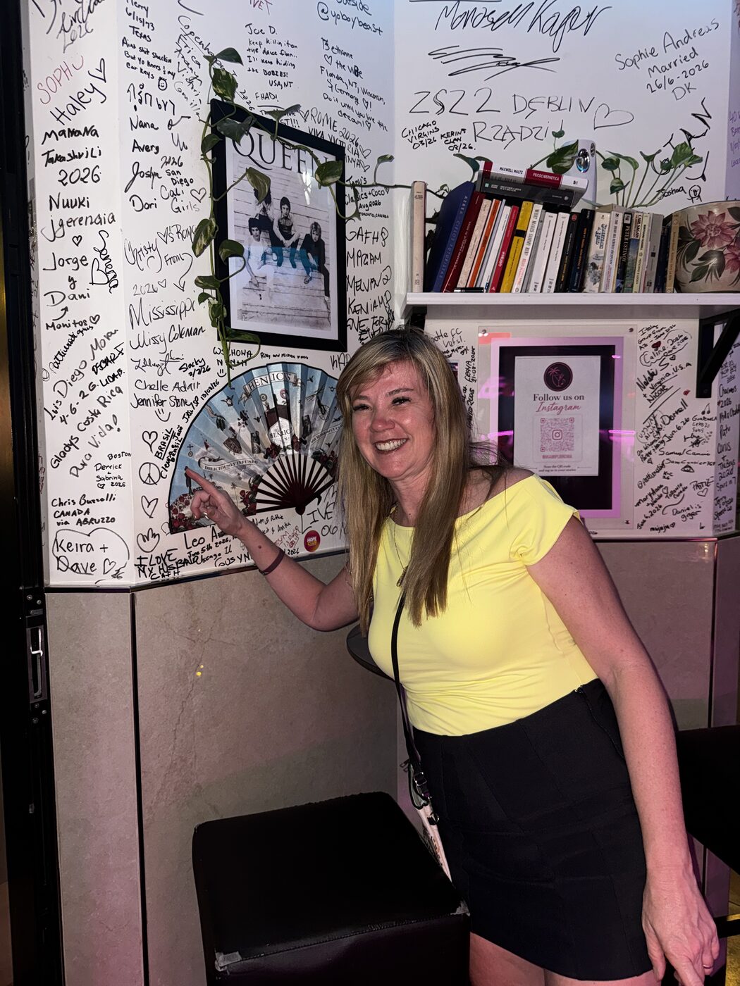 Guests adding their mark to the wall at Miami Pub Roma